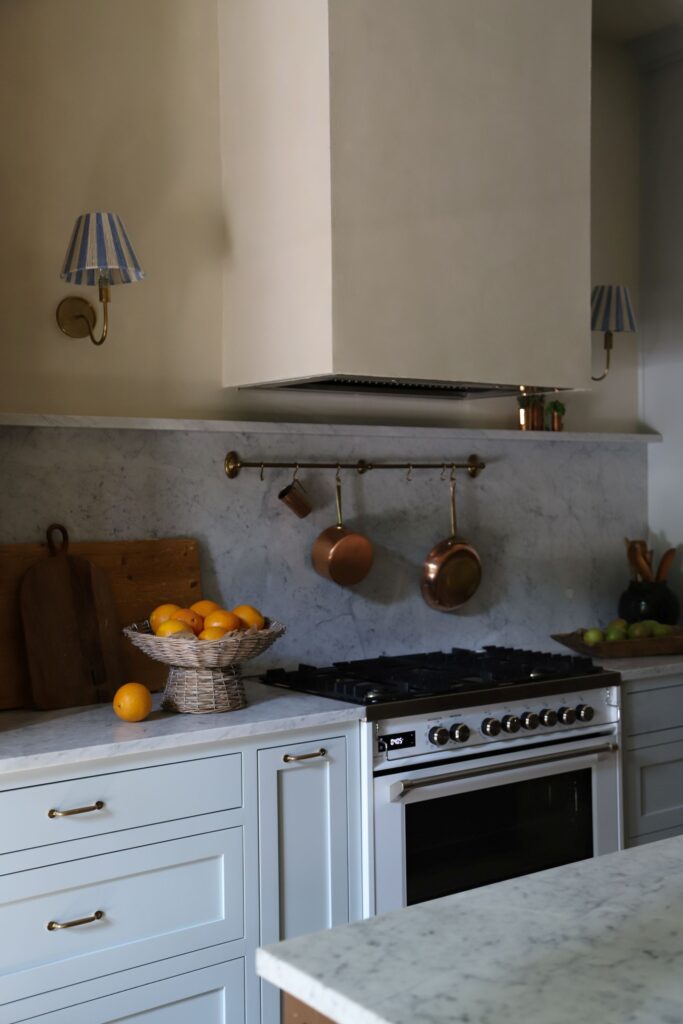 White Verona Ultima 36-inch dual fuel range in timeless designer kitchen